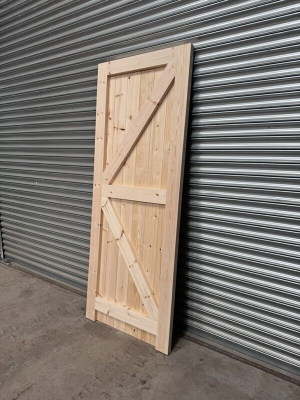 Detailing on a super heavy duty wooden garage side door