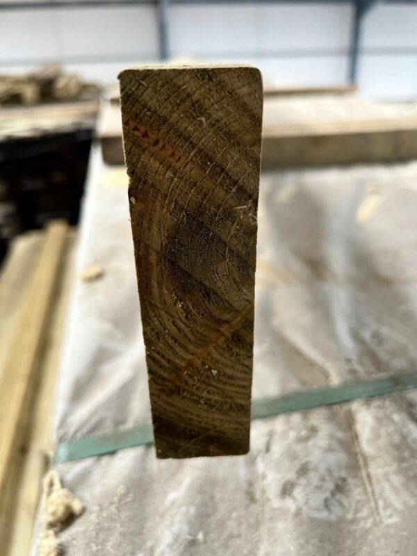 End of a plank of tanalised CLS timber