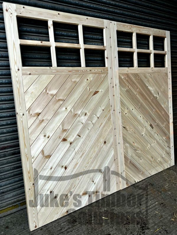 Front Overview Image of Herringbone Garage Doors Leaning Against Metal Shutters