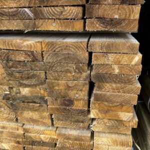 Stacked tanalised rough sawn timber