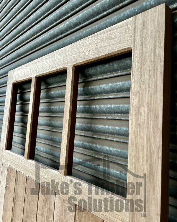 Close up of window panes on 3 pane oak garage side door