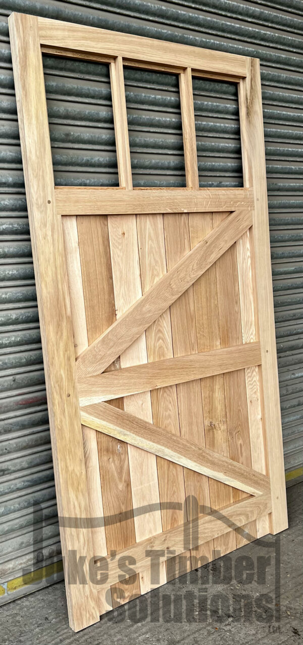 Rear of an oak 3 pane garage side door