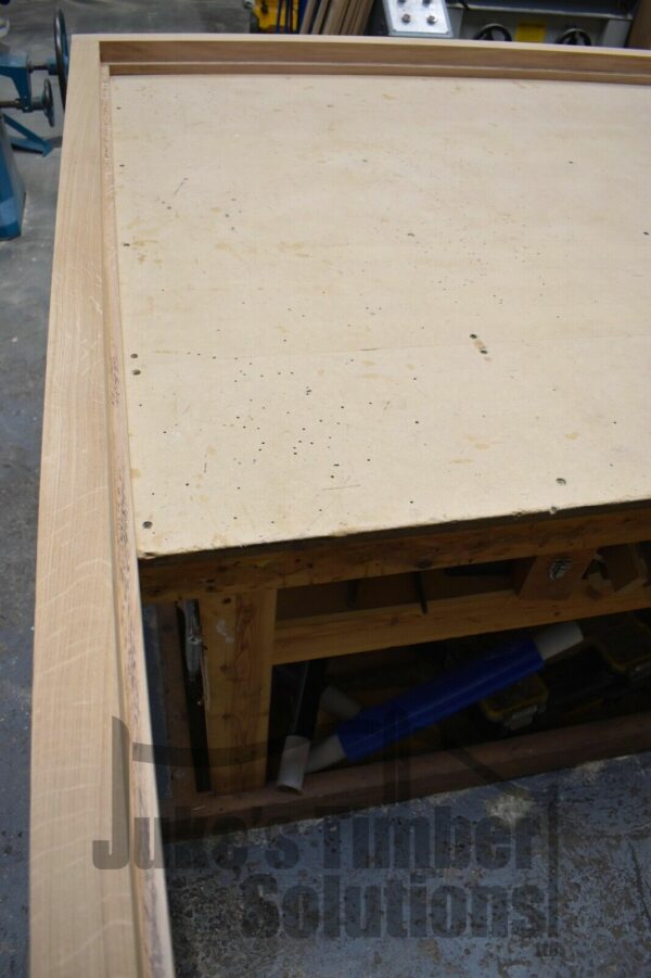 Side oak garage door frame being crafted in Juke's Timber Solutions workshop