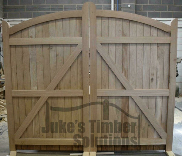 Oak Bow Top Driveway Gates pictured in the Juke's Timber Solutions workshop