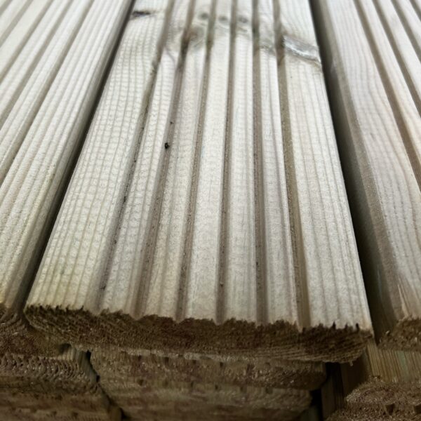 Close up of treated wooden timber decking