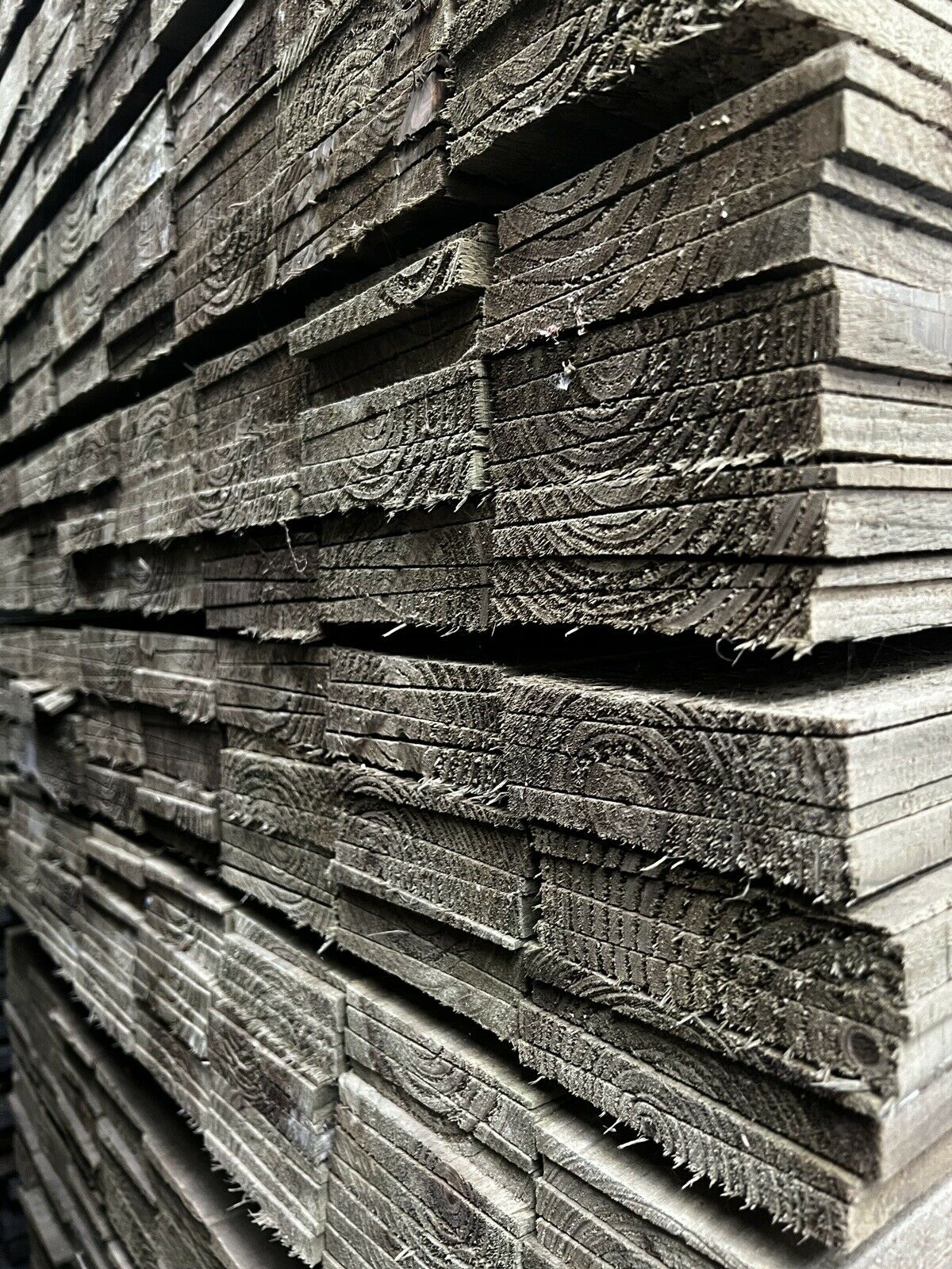Stacked tanalised feather edge boards