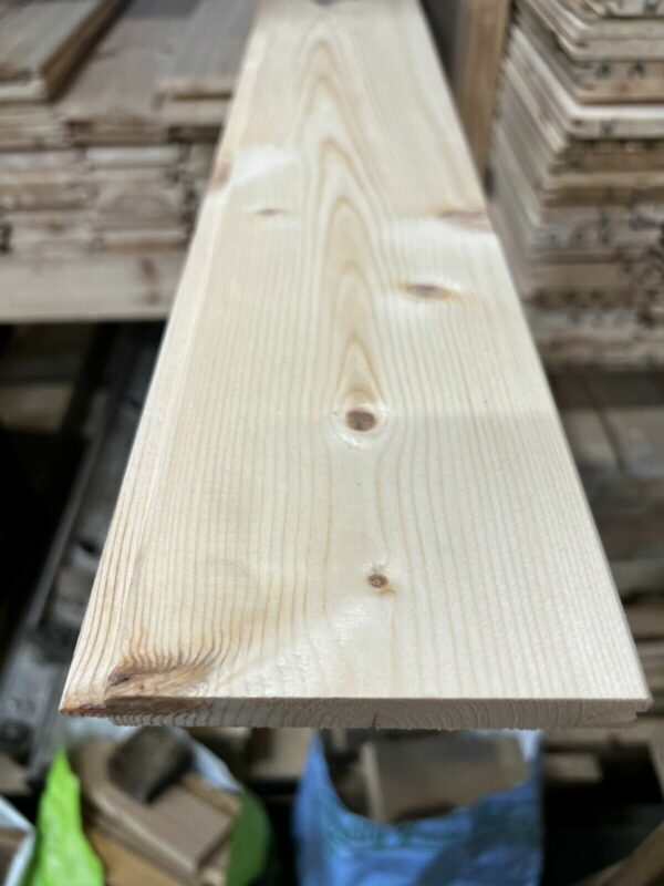 Length of tongue and groove cladding, 15mm match board pulled out from pile in timber yard.