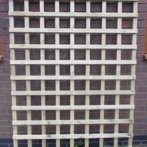 Square 6x4 wooden trellis against brick wall