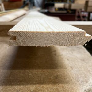 Edge of tongue and groove cladding 21mm match board.