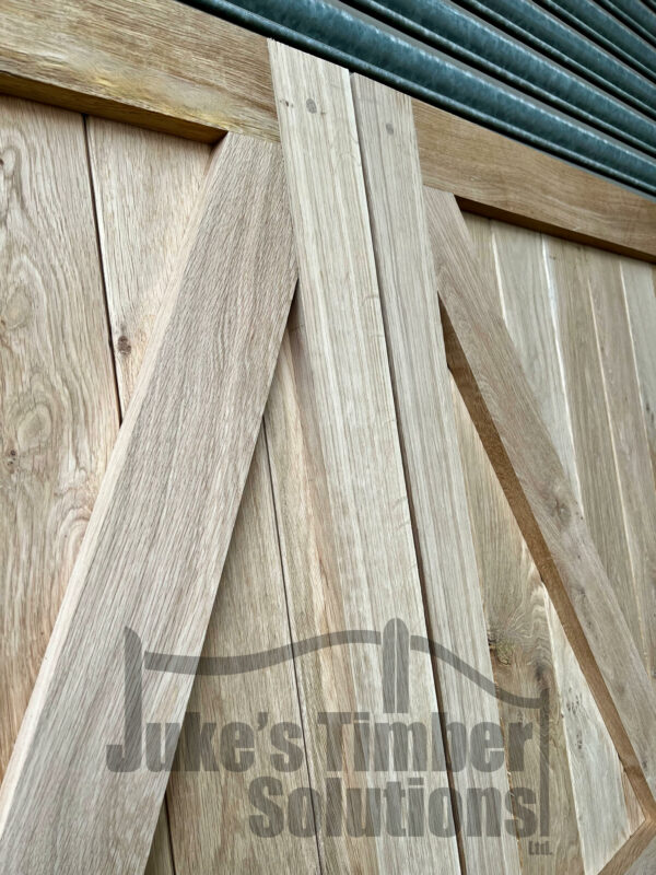 Close up of craftsmanship on oak full board super heavy duty garage doors