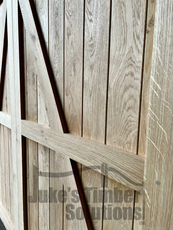 Close up image showing the right hand side interior detailing of a full board oak garage door.