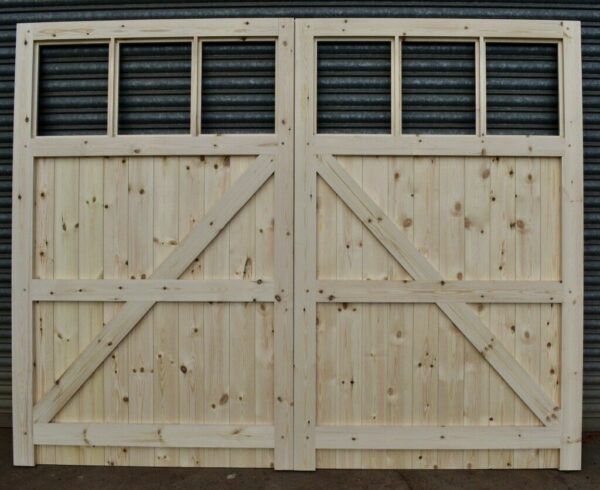 Rear of a wooden framed, ledged and braced garage door