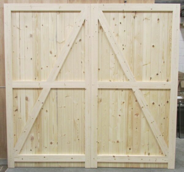 Interior of wooden garage doors, showing ledged and braced detailing