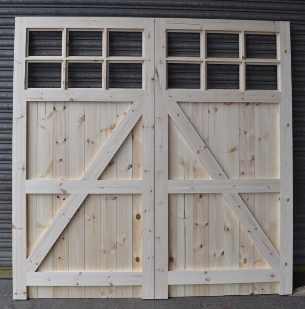 Interior detailing of heavy duty wooden garage doors with 12 panes.