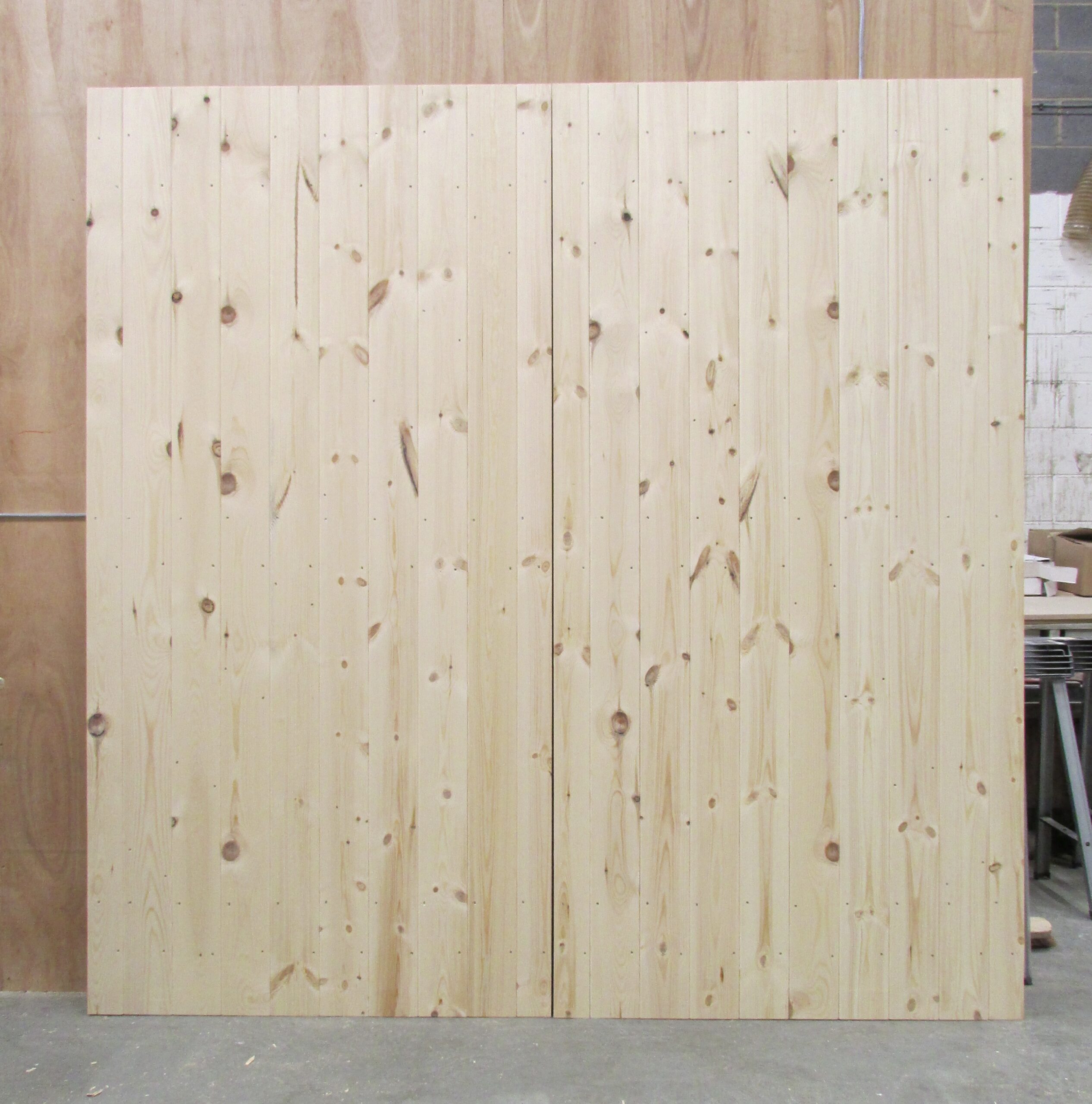 Wooden ledged and braced garage doors in workshop
