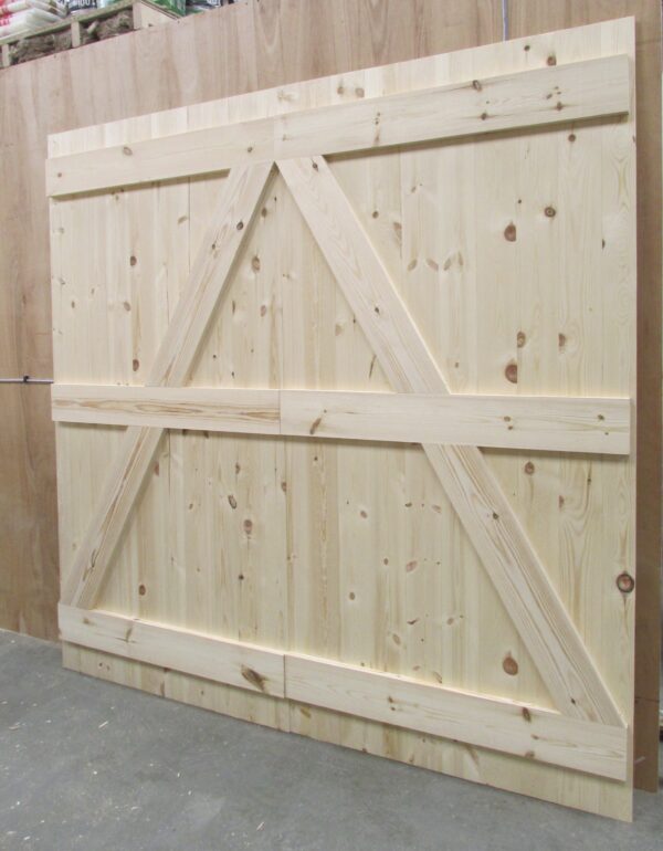 Rear right-hand image of ledged and braced detailing on wooden garage doors