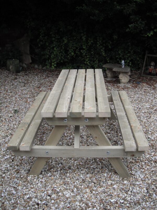 Green treated picnic bench and table