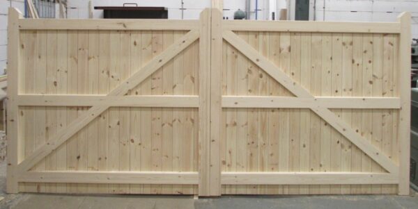 softwood flat top driveway gates standing in workshop