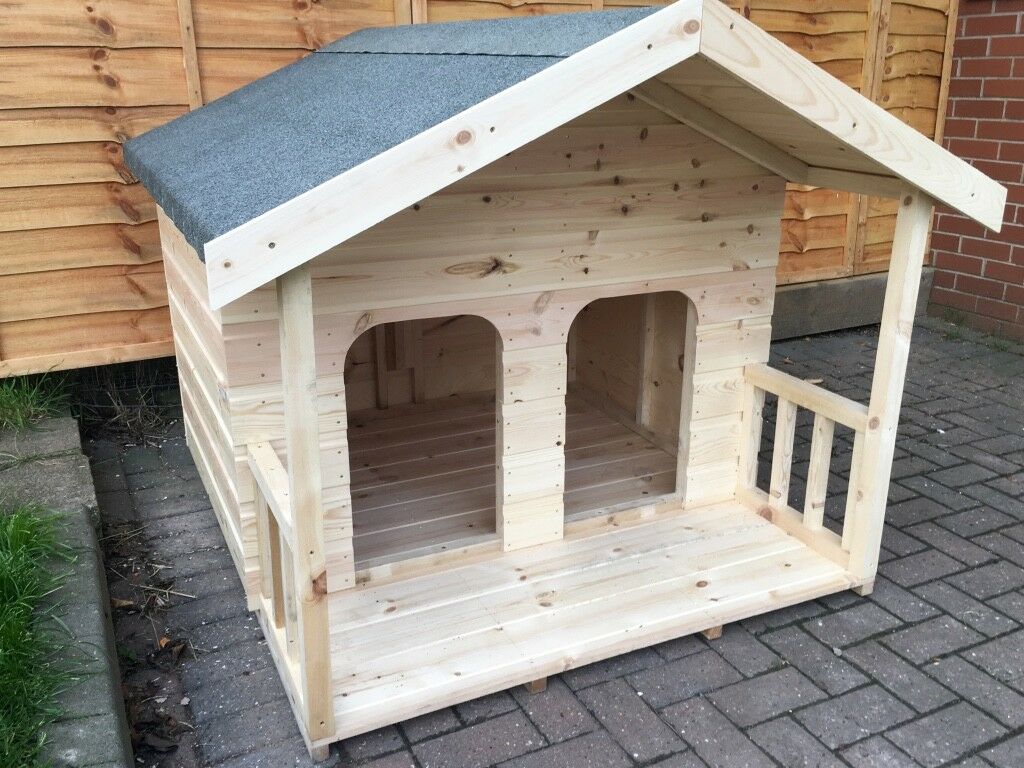 Wooden dog kennel with double door and veranda
