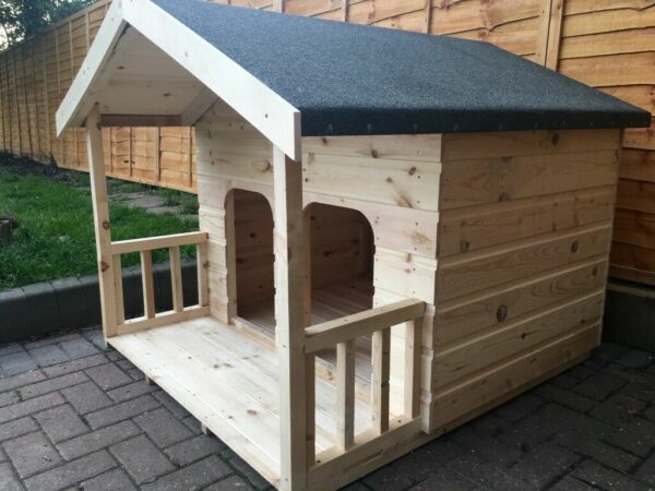 Apex dog kennel with veranda and double door, outside in garden